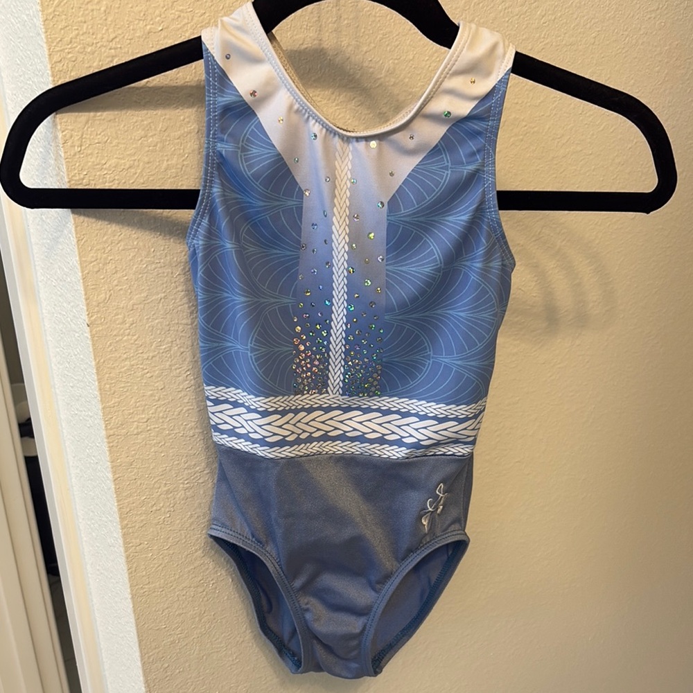 GK Suni CM blue and white leotard